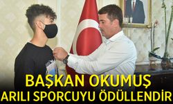 BAŞKAN OKUMUŞ, BAŞARILI SPORCUYU ÖDÜLLENDİRİLDİ