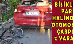 Bisiklet, park halindeki otomobile çarptı: 2 yaralı